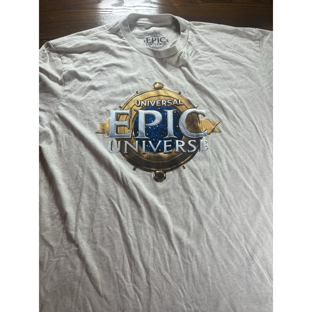Epic Universe Universal Studios UOTM Beige T-shirt Adult Unisex Size XL EUC